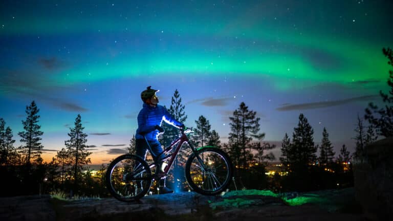 aurora borealis northern lights bike ride tour